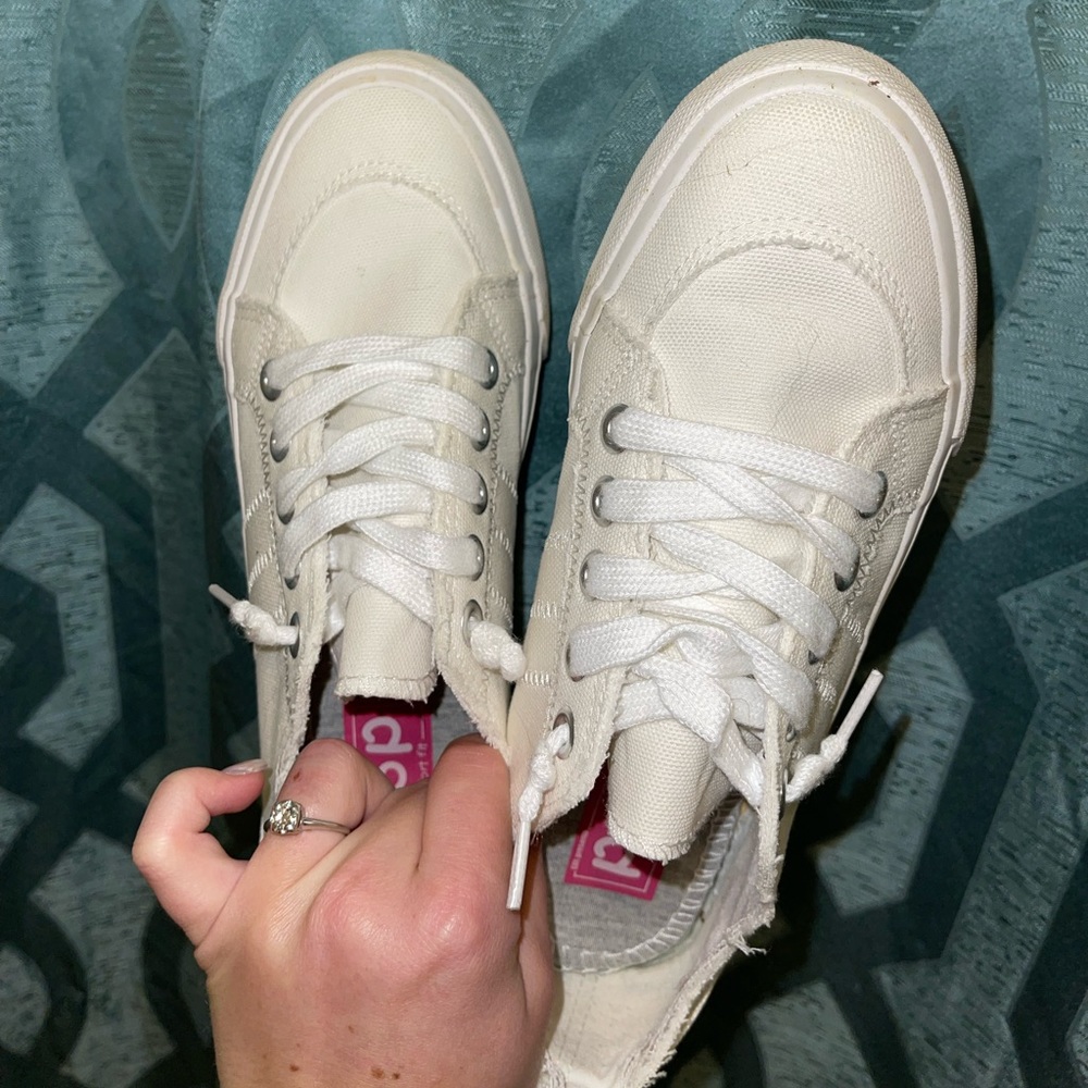 white flat sneakers